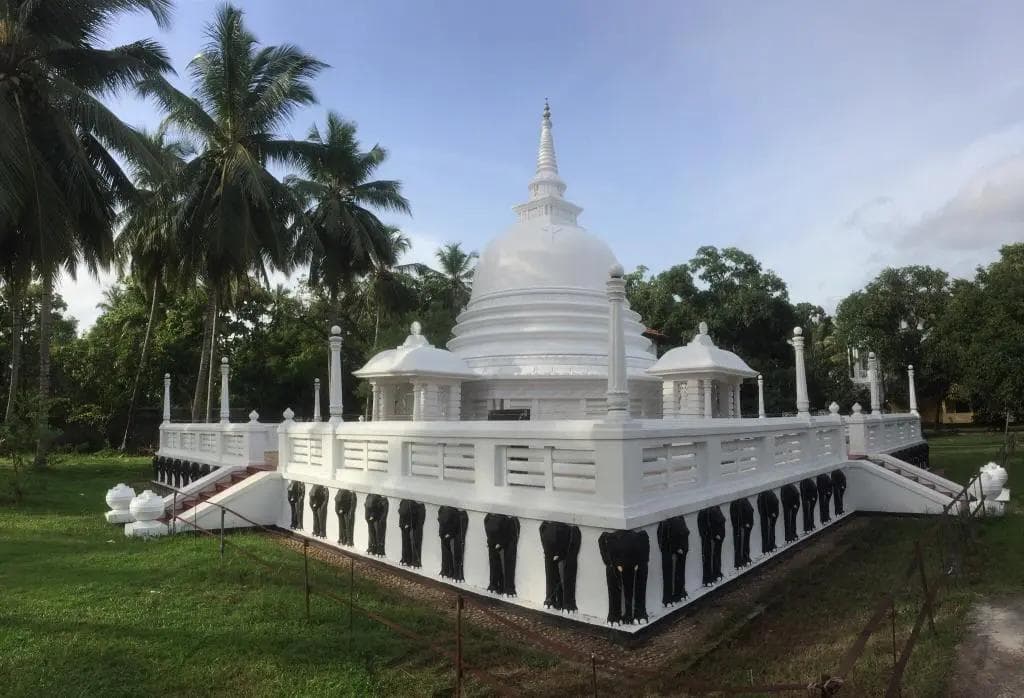 Negombo's majestic golden guardian at Angurukaramulla Temple